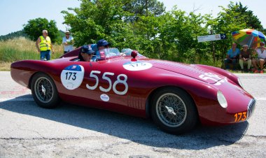 URBINO - ITALY - JUN 16 - 2022 : O.S.C.A. MT 4 - TN 1500 1955 on an old racing car in rally Mille Miglia 2022 the famous italian historical race