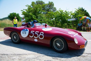 URBINO - ITALY - JUN 16 - 2022 : O.S.C.A. MT 4 - TN 1500 1955 on an old racing car in rally Mille Miglia 2022 the famous italian historical race