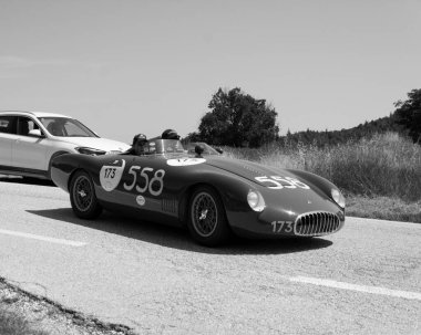 URBINO - ITALY - JUN 16 - 2022 : O.S.C.A. MT 4 - TN 1500 1955 on an old racing car in rally Mille Miglia 2022 the famous italian historical race
