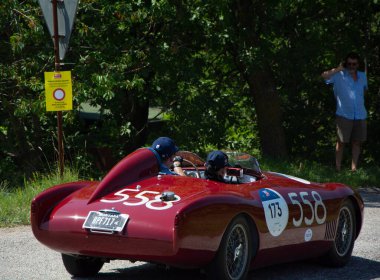 URBINO - ITALY - JUN 16 - 2022 : O.S.C.A. MT 4 - TN 1500 1955 on an old racing car in rally Mille Miglia 2022 the famous italian historical race