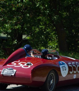 URBINO - ITALY - JUN 16 - 2022 : O.S.C.A. MT 4 - TN 1500 1955 on an old racing car in rally Mille Miglia 2022 the famous italian historical race