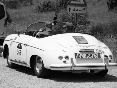 URBINO - ITALY - JUN 16 - 2022 : PORSCHE 356 1500 SPEEDSTER 1955 on an old racing car in rally Mille Miglia 2022 the famous italian historical race 1927-1957