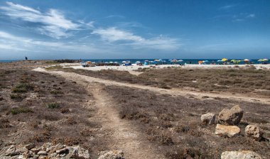 Arutas 'taki plaj. Sardunya, İtalya 2022 yazında