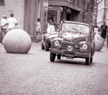 iTALY - 14 Haziran - 2023: FIAT 500 C 'TOPOLINO' 1951old car in rally Mille Miglia 2023 the famous Italian history race (1927-1957iTALY - 14 Haziran 2023 -: FIAT 500 C 'TOPOLINO' 1951old race car in rally Mille Miglia 2023