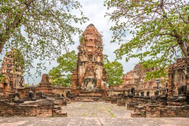 View at the Ancient ruins of Wat Mahathat in Ayutthaya - Thailand