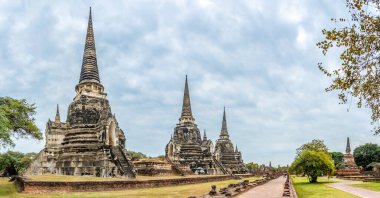 AYUTTHAYA,THAILAND - JANUARY 28,2023 - Panoramic view at Wat Phra Si Sanphet in Ayutthaya. The Ayutthaya Kingdom existed  from 1351 to 1767.