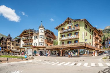 SAN MARTINO DI CASTROZZA,ITALY - JUNE 22,2024 - In the streets of San Martino di Castrozza in Italian Dolomites. San Martino offers some of the most breathtaking scenery in the Dolomites clipart