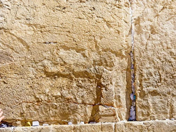 stock image Texture of the stones with notes inserted in crevices of the Western Wall (Wailing Wall), Jerusalem, Israel