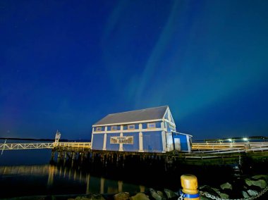 SIDNEY BC, CANADA - MAY 10, 2024. Aurora Borealis illuminates the sky in rare intensive solar activity clipart