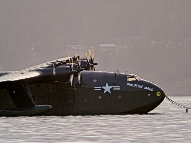 North Saanich, BC, Canada - December 21,2024. Iconic Coulson Philippine Mars in the waters of Patricia Bay, Vancouver Island, for repairs on final trip to Pima Air and Space Museum in Tuscon, Arizona clipart