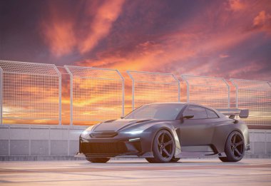 Gün batımında parlak siyah spor araba.