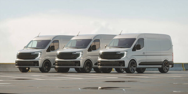 Флот современных грузовых фургонов на парковке.