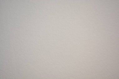 Düz beyaz desenli duvar arkaplanı.