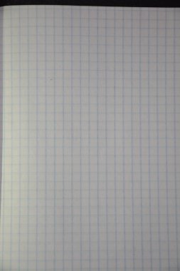 Close-up of blank graph paper with a grid pattern. clipart