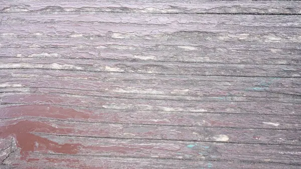 Yıpranmış ahşap desenli soyulmuş boya.