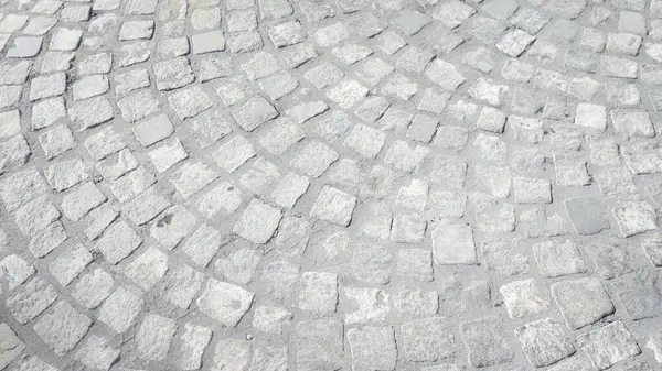 Çakıl taşı kaldırım desenine yakın çekim