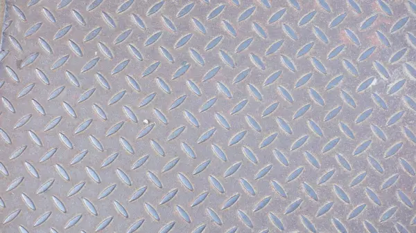 Elmas desenli desenli metal zemin.