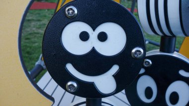 Cute smiley face playground equipment