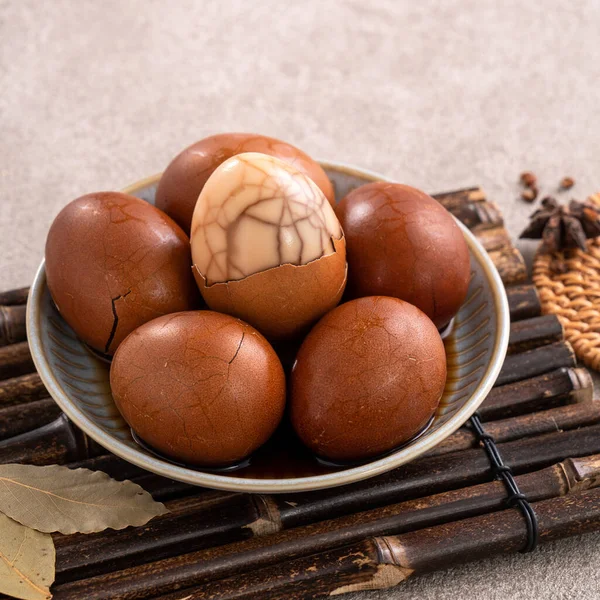 Stock image Close up of delicious traditional Taiwanese famous food tea eggs with in a bowl on gray table background.