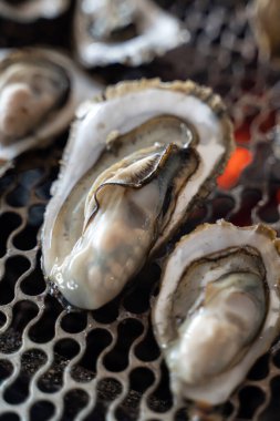 Grilled fresh oyster in Tainan, Taiwan, the famous Taiwanese street food gourmet.