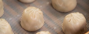 Tayvan 'daki ünlü gurme Xiao long bao adında haşlanmış domuz çorbası..