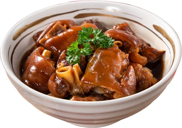 Taiwanese traditional food pork knuckle isolated on white background for Chinese Lunar New Year meal.