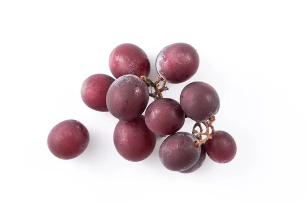 Köstlicher Bund Lila Trauben Früchte Verschüttet Über Weißen Tischhintergrund — Stockfoto