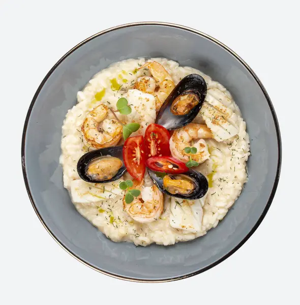 Risotto with seafood: shrimp and mussels. Isolated image