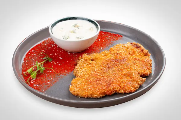 stock image Chicken schnitzel with blue cheese sauce and paprika