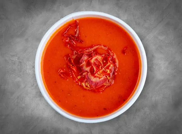 stock image Tomato soup. Healthy food. Takeaway food. Top view, on a gray background.