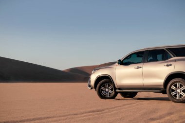 Toyota Fortuner  standing in the middle of the desert. Walvis Bay, Namibia. Africa 