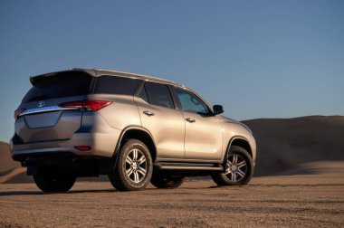 Toyota Fortuner  standing in the middle of the desert. Walvis Bay, Namibia. Africa 