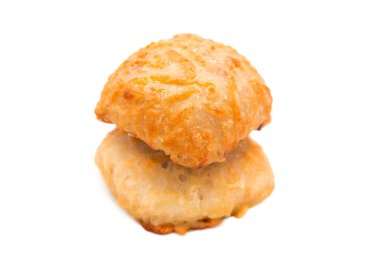 Freshly baked cheese buns isolated on white background.