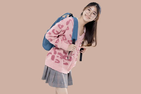 Happy Asian Ethnicity Teen Girl Hold Backpack Isolated Brown Background — Stock Photo, Image