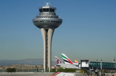 Madrid, November 14, 2017: Control tower of the Adolfo Suarez Madrid-Barajas Airport. Spain. clipart