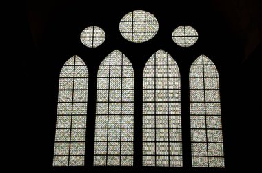 Stained glass windows. Interior of the Mont-Saint-Michel Abbey. Mont-Saint-Michel. Brittany. France. clipart