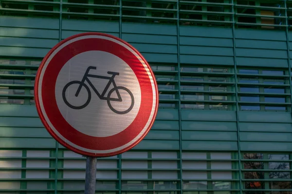 stock image Dutch Traffic sign: bicycles are prohibited in fron of a modern architecture in the Netherladns