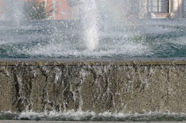 water flows down the wall part of the fountain nice background.