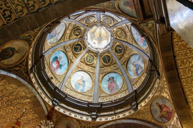 Lluc, Majorca, Spain - September 16, 2024: View of the richly decorated dome inside the Sanctuary of Lluc, the most important pilgrimage site in Mallorca clipart