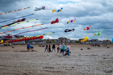 St Annes Lancashire, United Kingdom, August 30th 2025, St Annes Kite Festival. Attendees prepare kites for flight at the annual festival