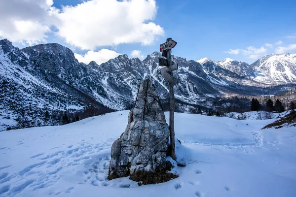 alpine trail signs with rock in Recoaro Vicenza Veneto Italy