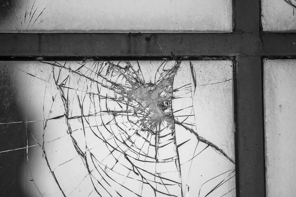 broken glass close up of crack formed by broken glass monochrome photography of broken glass breaking concept of Torri del Benaco on Lake Garda in Verona Veneto Italy Europe