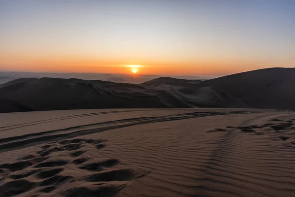 Sunset in the desert near Ica in Peru