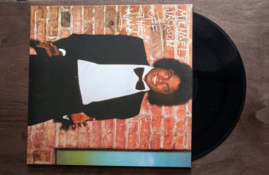 Lublin, Poland. 18 January 2023. Michael Jackson Off the Wall long play on dark wooden table