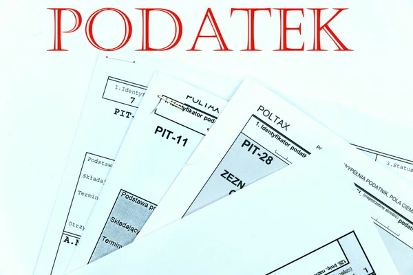 Polish end of year tax return forms called PIT with text podatek (which means tax in English) written on top