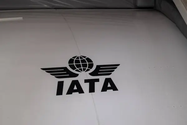 stock image Logo of IATA ( International Air Transport Association) - trade organisation of world's airlines on a side of a plane