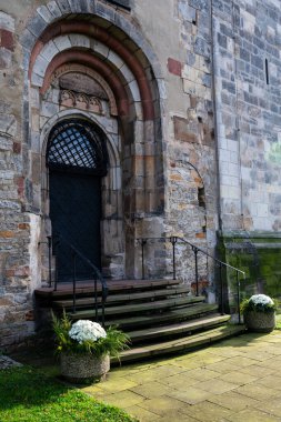 Opatow, Poland, November 11 2023 Romanesque church of Saint Martin of Tours in swietokrzyskie Voivodeship, a Polish Historic Monument clipart