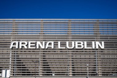 Lublin, Poland 25 September 2025 two fancy stainless steel olive oil dispensers on a wooden table at a restaurant