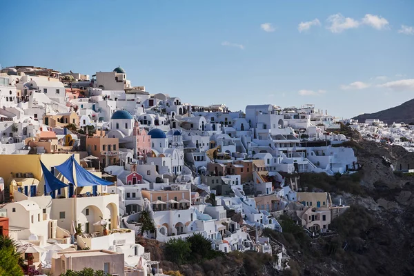 stock image Panoramic Aerial View of the Poscard Perfect Oia Village in Santorini Island, Greece - Traditional White Houses in the Caldera Cliffs - Sunset