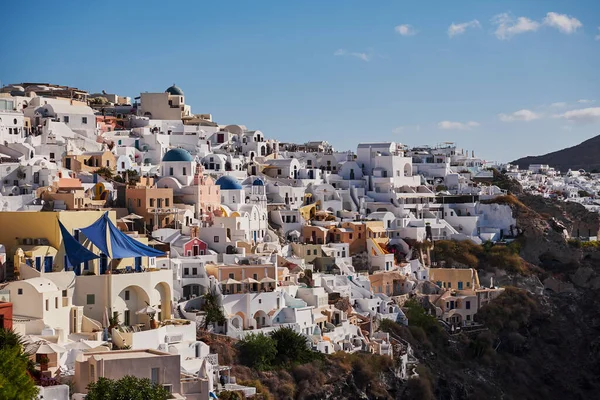 stock image Panoramic Aerial View of the Poscard Perfect Oia Village in Santorini Island, Greece - Traditional White Houses in the Caldera Cliffs - Sunset